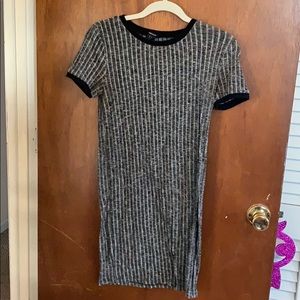 Above the knee short sleeved sweater dress.